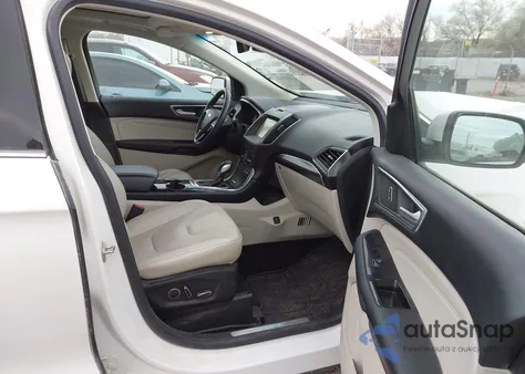 2015 Ford Edge Titanium z USA, uszkodzony, nr VIN 2FMPK4K98FBB74140